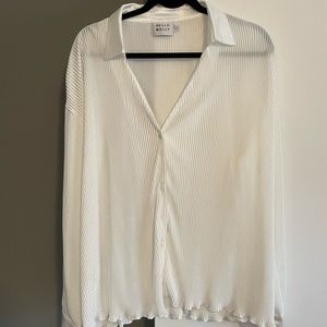 White silky pleated blouse